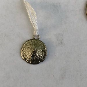 Sand dollar charm. Cute beachy jewelry.